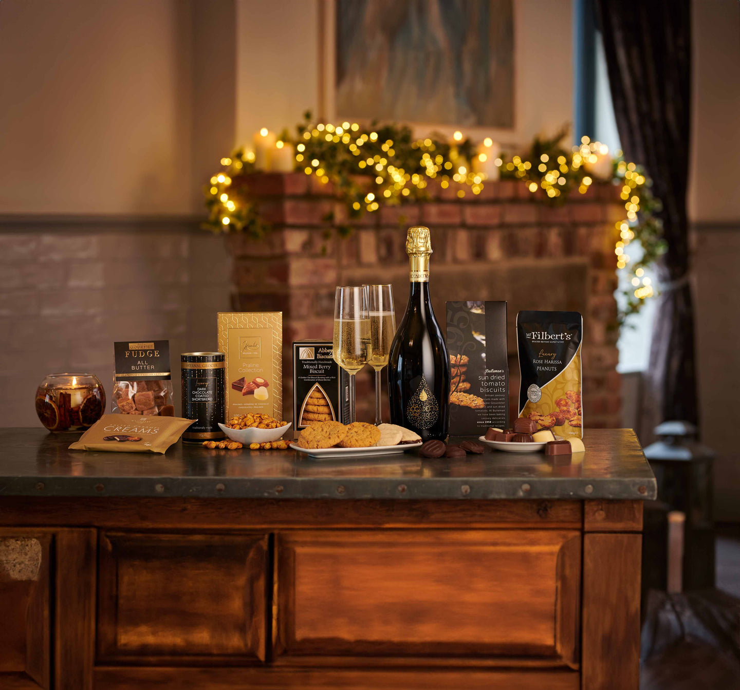 A black gift box sat on top of a wooden table in front of a black background.